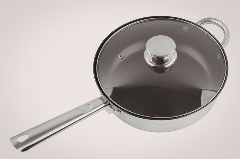 Dark hexagonal patterned HexClad pan — TerraBond ceramic coating review