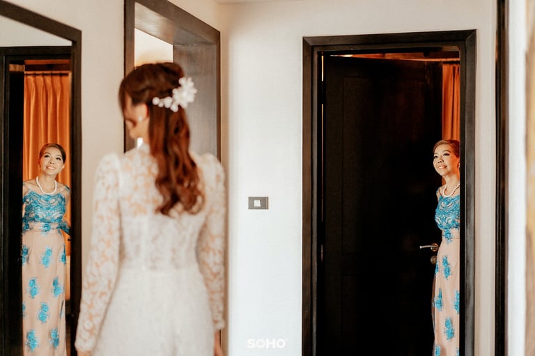 a woman in a white dress and a woman in a dress