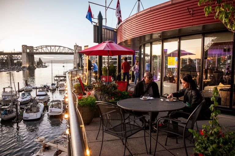Attendees of the Vancouver International Film Festival eating on the patio of a yacht club