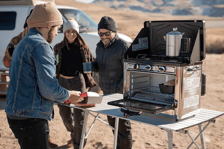campers using a Camp Chef Portable Camp Oven for easy camp cooking