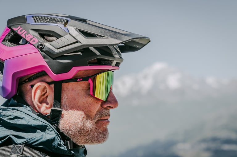 a man wearing a helmet and a helmet with a helmet on