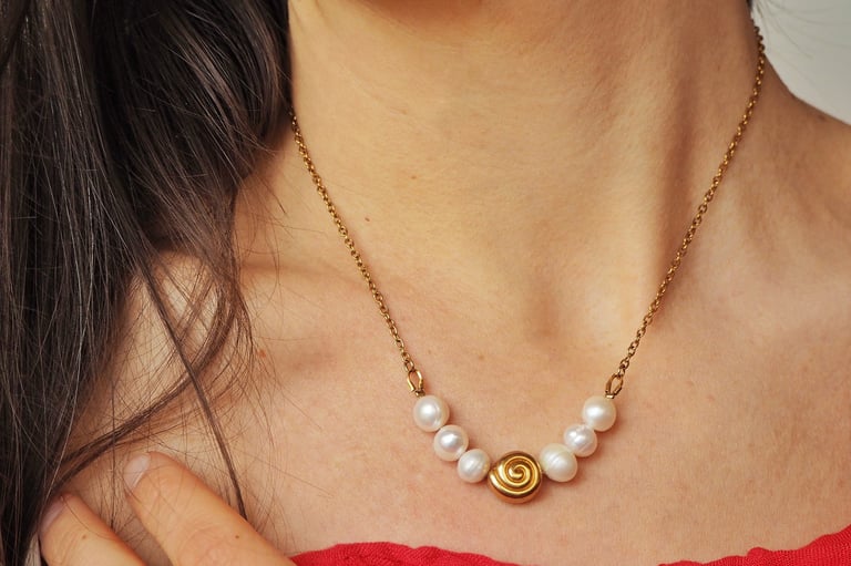 pearl necklace with stainless steel components. Jewelry care guide