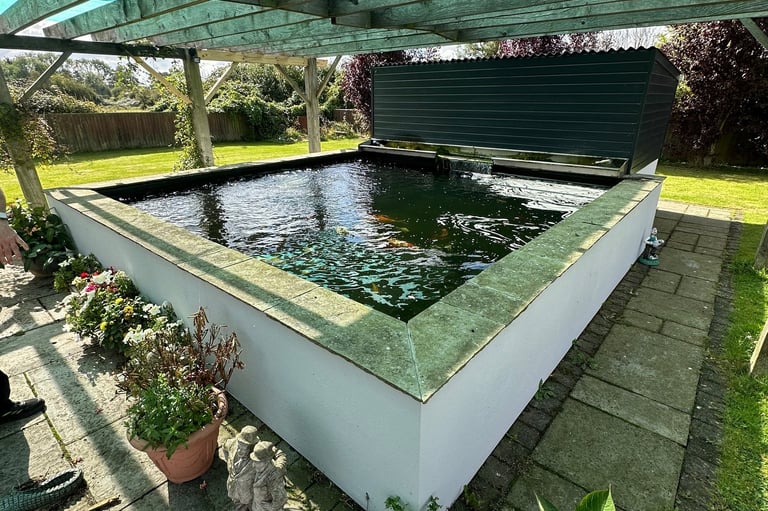 Raised block koi garden ponds