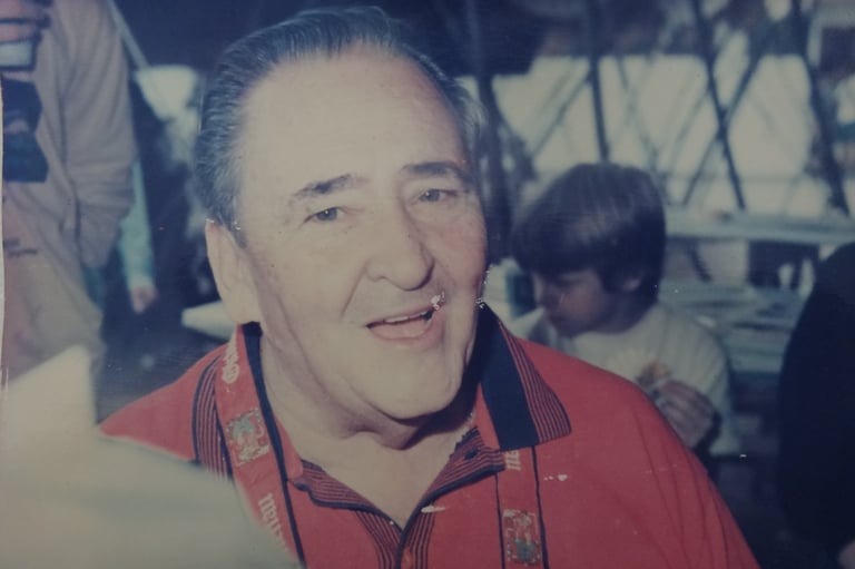 a man with a camera and a camera on a tripod