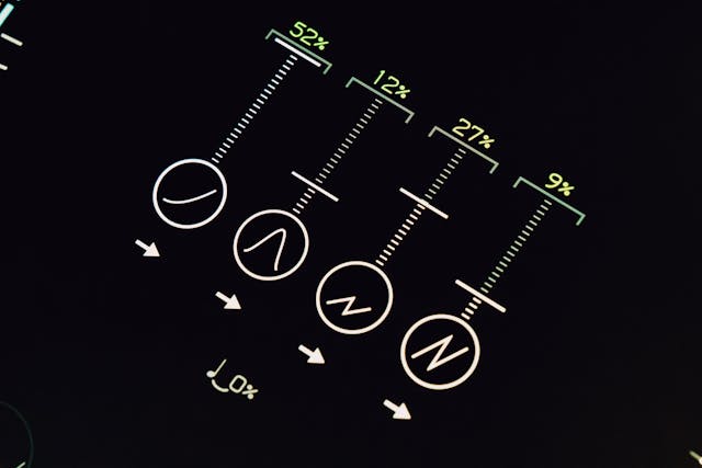 a close up of a black and white control panel