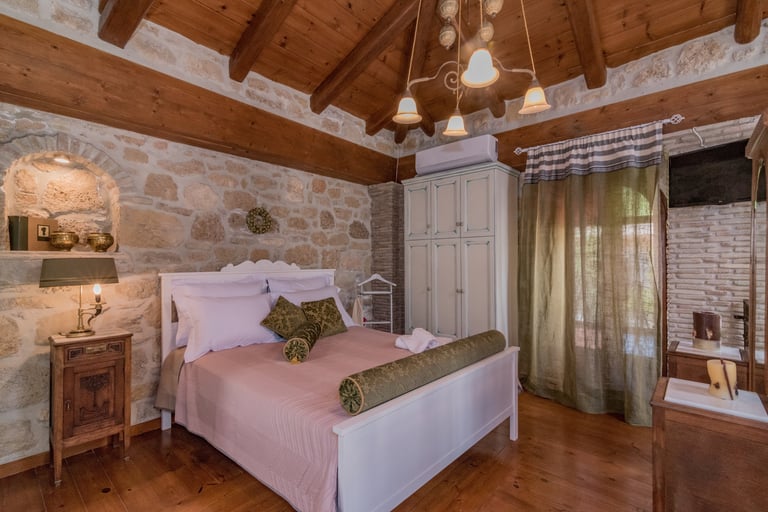 Convenient Queen size bed in open space badroom in Villa Galanoussa Zakynthos