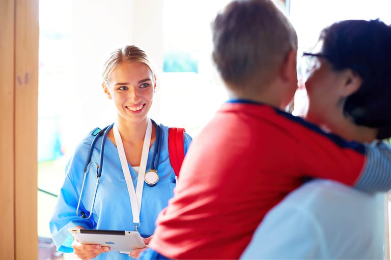 a nurse in a blue scrub suit arriving at patient's home