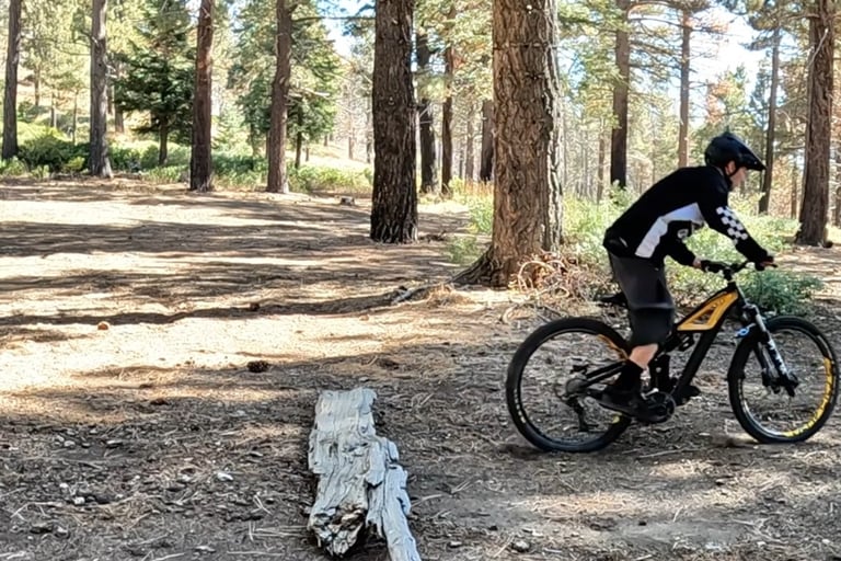 landing after a bump jump on a mountain bike