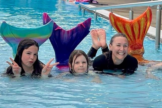 Kids learning to swim like a mermaid