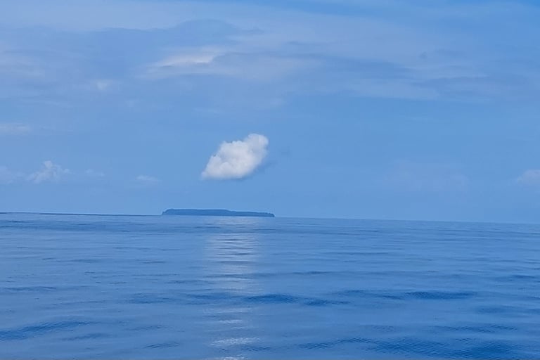 Cano Island seen from distance in a tour with Coral Expeditions Costa Rica 