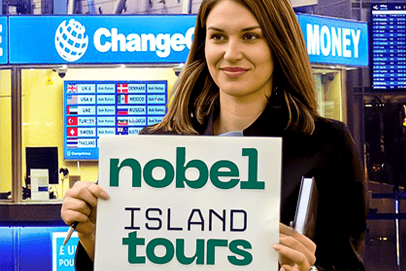 Professional driver holding name board at Colombo Airport pickup for guests