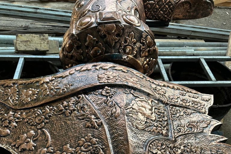 Bagian Patung keris berbahan tembaga