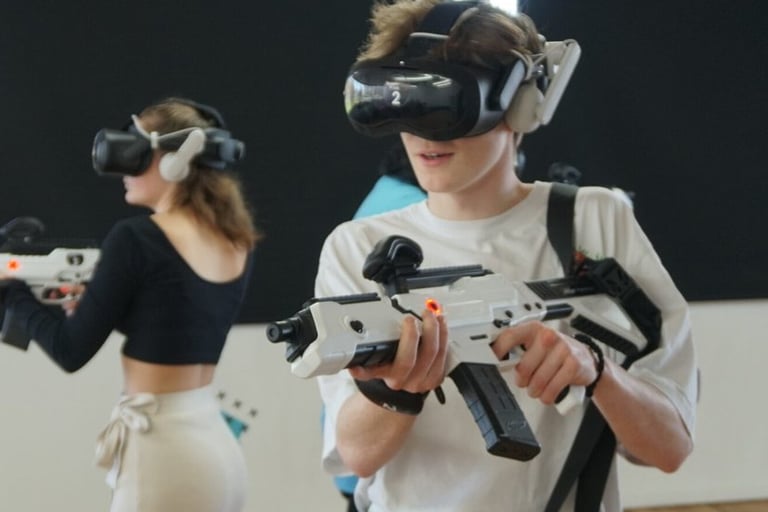 a man and woman in vr headsets with vr goggles