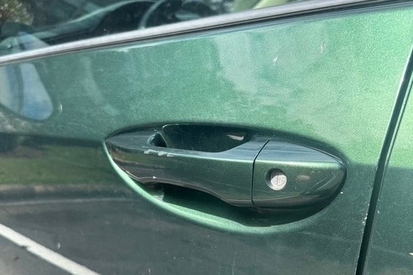 2016 Green Toyota Corolla door lock repaired by local and affordable locksmith