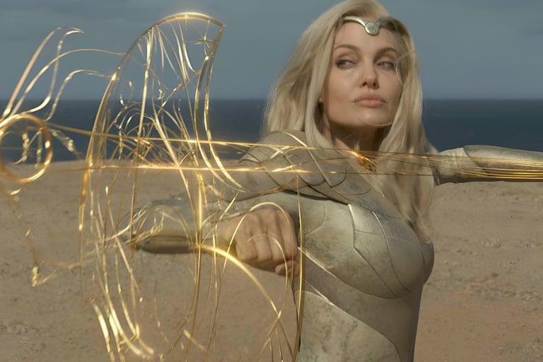 a woman in a silver dress with a sword