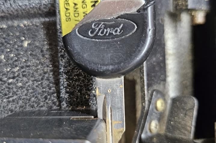 A close up a of ford key that is damaged and fixed by trusted Jacks’s Locksmith key cutting service in Candler, NC