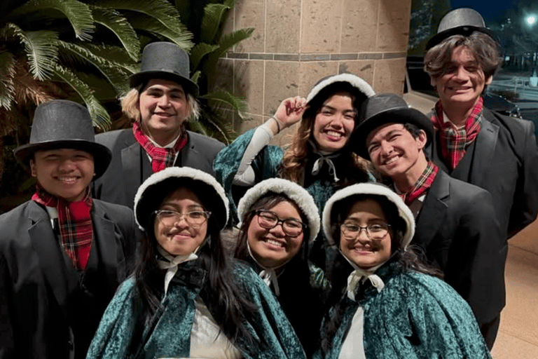 Las Vegas Christmas carolers in caroling garb