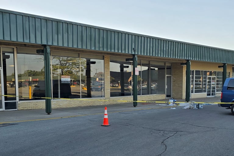 Prep, prime and repainting of storefront.
