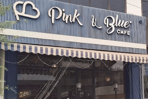 An image showing facade of Pink and Blue cafe