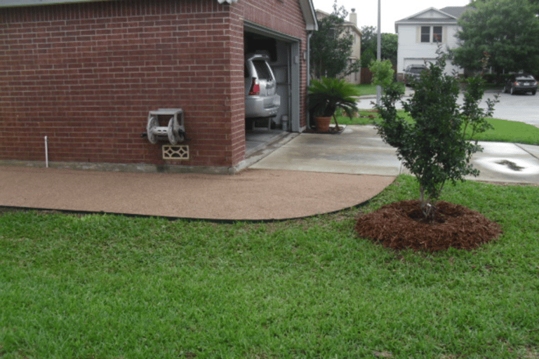 decomposed granite walkway alongside house 