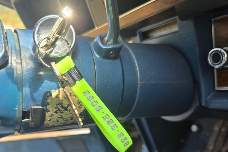 Jack’s Locksmith key in classic car ignition representing expertise in key cutting and vintage key cutting in Swannanoa, NC