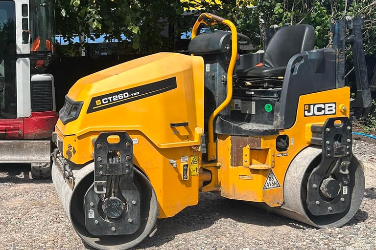 Twin-drum roller hire compacting base for driveway in Oldbury