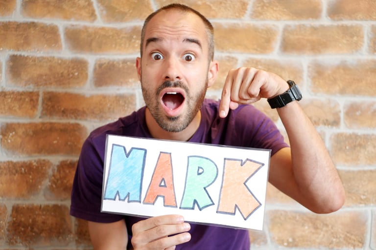 mentor mark holding sign fun play creativity