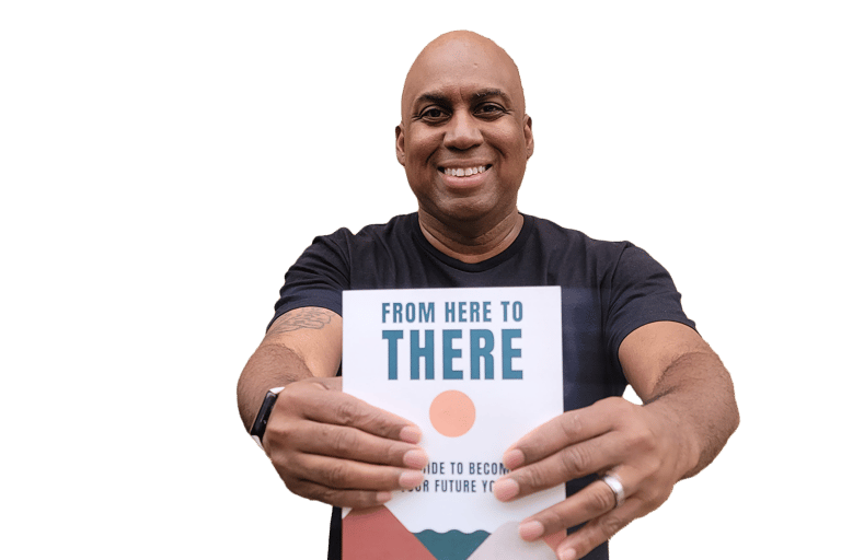 Lee Jones holding a book about how to write a book