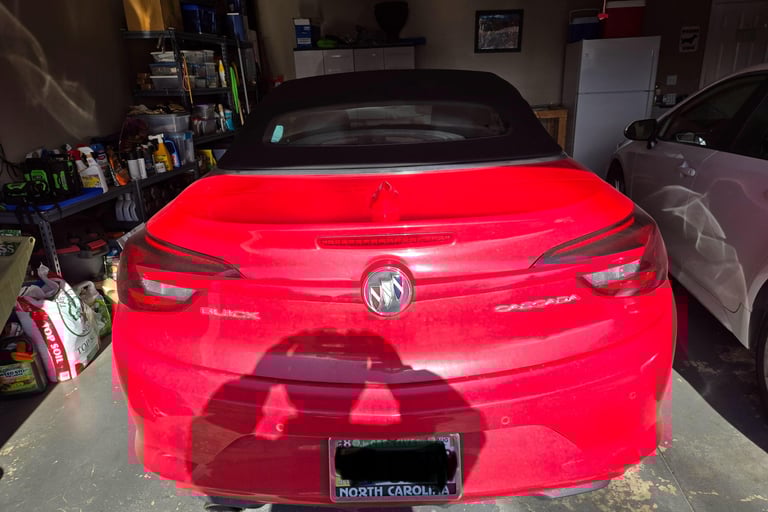 A red Buick car representing Jack’s Locksmith luxury car key and ignition service