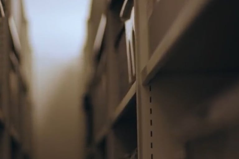 A row of shelving in an archive store