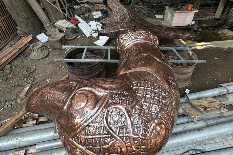 Bagian Patung keris berbahan tembaga
