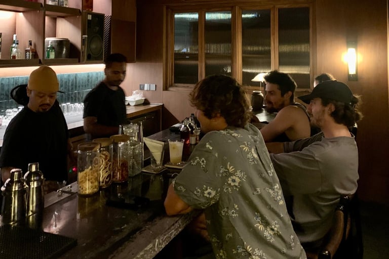 Kenji Ramen Bali Padang Linjong hidden bar guests enjoying craft cocktails - intimate Canggu