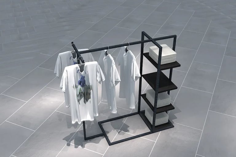 Modern black metal retail clothing rack with white t-shirts and display shelves on a grey floor.