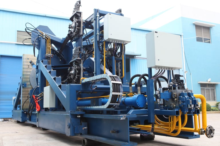 Side view of a wire rod bundling machine used in steel mill finishing lines