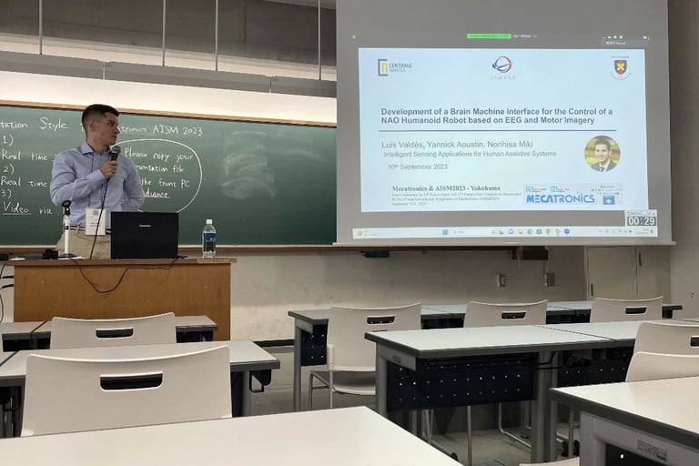 Luis Valdes at the Yokohama Mechatronics international conference in 2023 presenting his research