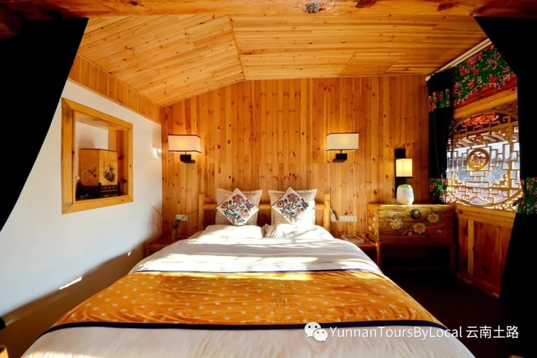 Chongyu Boutique Hotel, traditional wood house with courtyard, run by local ethnique Bai People.