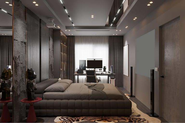 Modern luxury bedroom interior with a tufted gray bed, workstation desk, and home cinema projector.