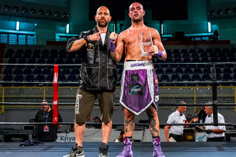 Miguel Bachi pugile con il coach Yari Flammia