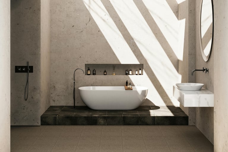 Natural stone floor in a Mediterranean bathroom with raking light.