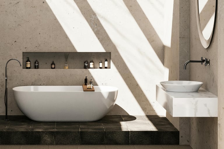 Stone and plaster carrying color in a French Mediterranean bathroom.