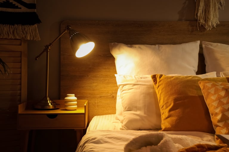 Bedroom palette holding under low evening light in a French Mediterranean room.