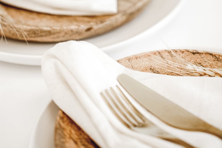 Linen on a wood dining table, French Mediterranean.