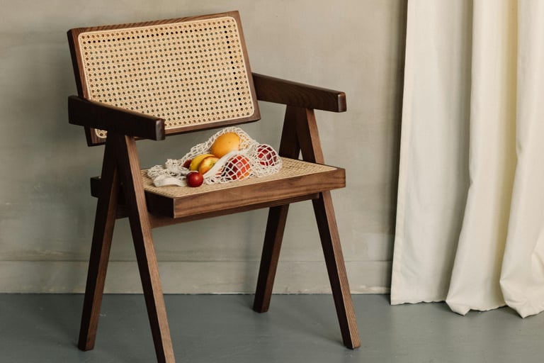Low grounded dining chair in a French Mediterranean room.