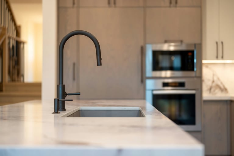 Honed stone kitchen counter with light raking across in a French Mediterranean kitchen!