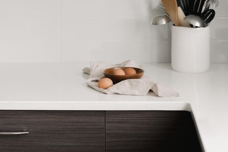 Continuous stone counter in a French Mediterranean kitchen.