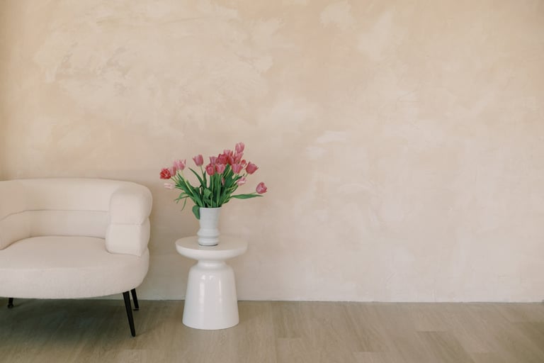 Low seating and vertical space in a French Mediterranean living room.