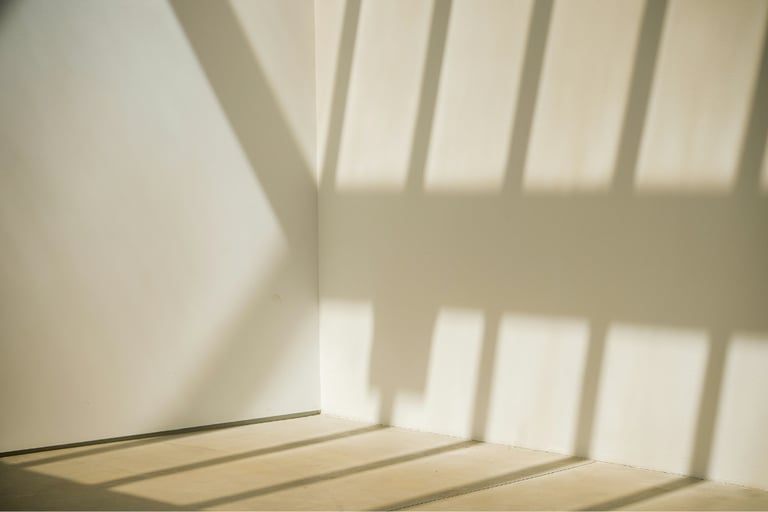 Warm white mineral paint walls and stone floor in a Mediterranean new build.