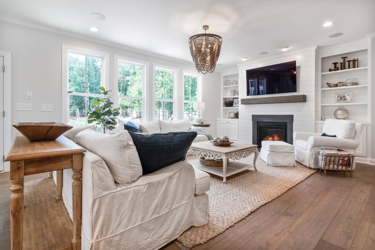 A living room where furniture has enough space around it to read individually.