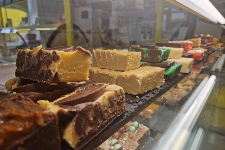 Fudge display. Chocolate Orange, Caramel, Chocolate mint, Vanilla.