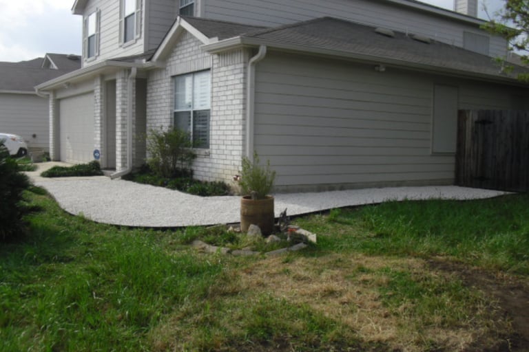 Limestone Gravel Walkways along house 